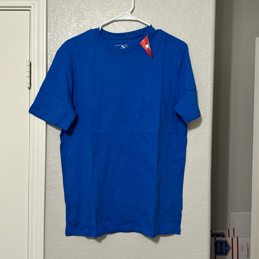 2 black and Royal blue PUMA united Blank Tees